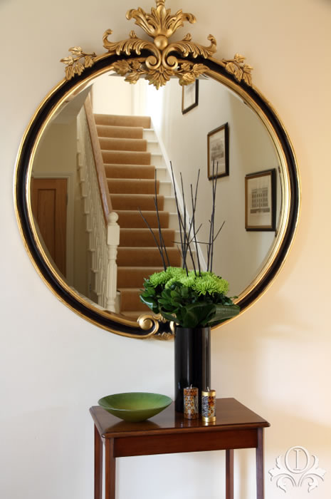 This beautiful mirror makes a lovely focal point in a traditional hallway in a house in Weybridge, Surrey.